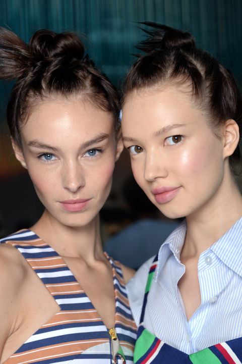 We loved the look at Tanya Taylor in NY where NARS International Lead Makeup Stylist, Uzo, gave the girls' illuminated skin and a pinky-lilac lip (courtesy of the NARS Velvet Matte Lip Pencil in Never Say Never). The models also sported sprouting topknots for graphic effect.