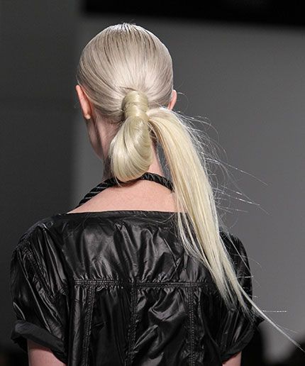 Inspired by the classic topknot, Macadamia Professional's ambassador Giannandrea Marongiu used their products to do 'the back knot', a lower version. Using hair extensions for length, he basically created a loop with the models' ponytails and then tied it back on itself at the ponytail base, concealed with a small section of loose hair. Cool!
