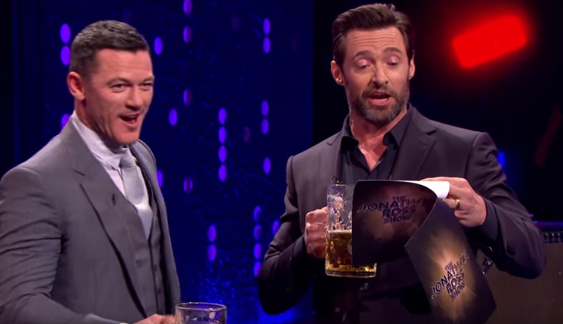 Hugh Jackman and Luke Evans had a Gaston Beauty and the Beast singoff