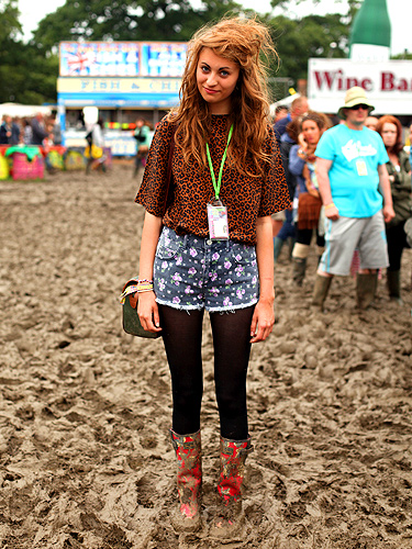 Lucy went bold, colour clashing her prints in floral Topshop shorts and a leopard print top she found in a charity shop